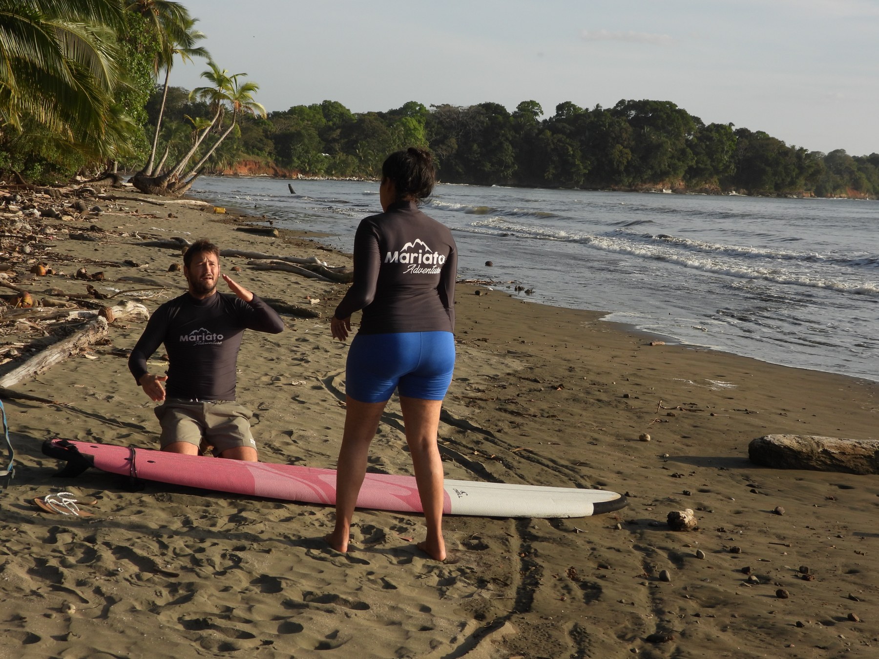 Mariato Adventure instructor teaching surf techniques on the beach